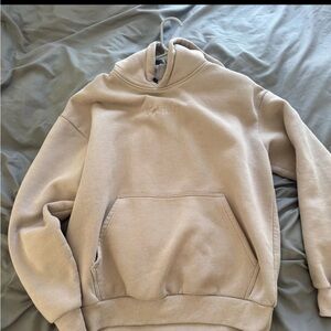 Women's Cream Pullover Hoodie with Subtle Logo